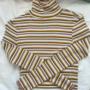Tilly’s turtle neck. Size Medium.